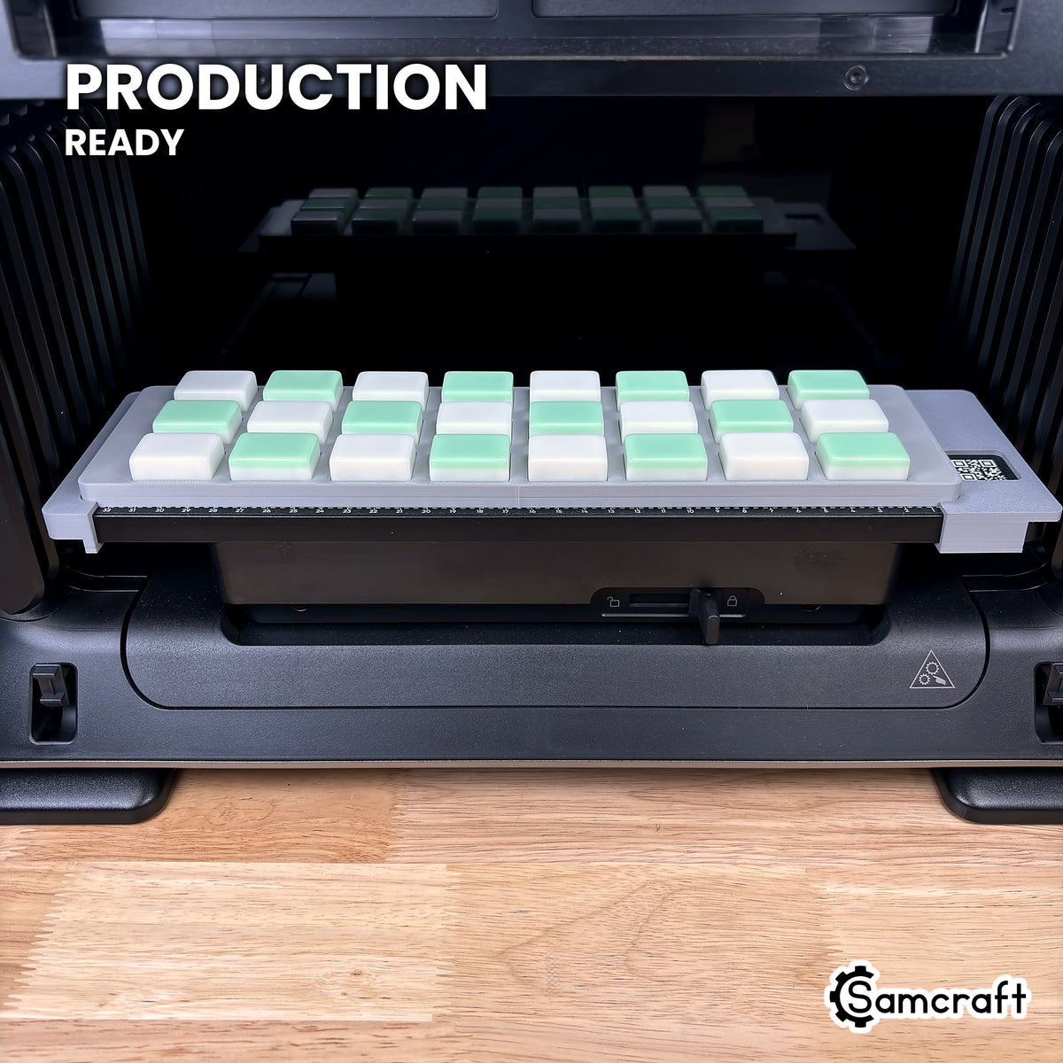 Samcraft mahjong tile jig loaded with 24 tiles on the eufyMake E1 UV printer bed, set up for production runs.