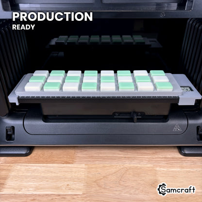 Samcraft mahjong tile jig loaded with 24 tiles on the eufyMake E1 UV printer bed, set up for production runs.