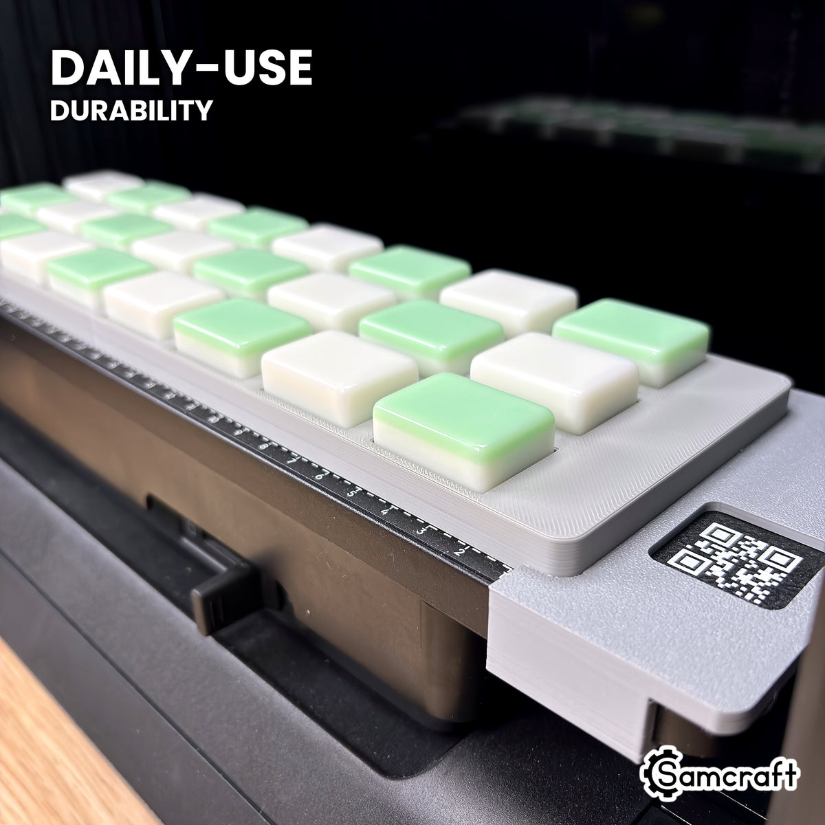 Samcraft eufyMake E1 mahjong tile jig loaded with tiles, shown at an angle to highlight its solid one-piece build.