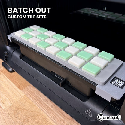 Samcraft mahjong tile jig on the eufyMake E1 UV printer bed holding 24 tiles, ready to batch out custom tile sets.