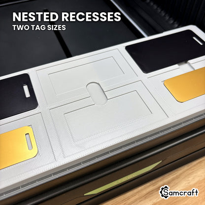 Close-up of the nested recesses in the Samcraft xTool Omni luggage tag jig, the large tag in the outer step and the small one in the inner.