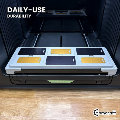 Samcraft xTool Omni metal luggage tag jig held in hand, showing the durable one-piece construction built for daily use.