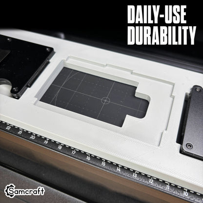 Empty pocket of the Samcraft Metal Wallet Jig showing the alignment grid and thumb notch relief for easy removal