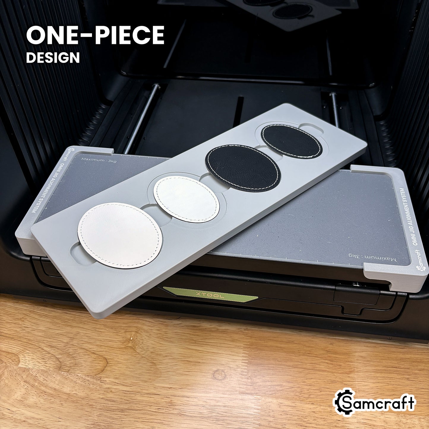 The one-piece Samcraft oval patch jig for the xTool Omni, four leatherette patches seated in a single molded tray.
