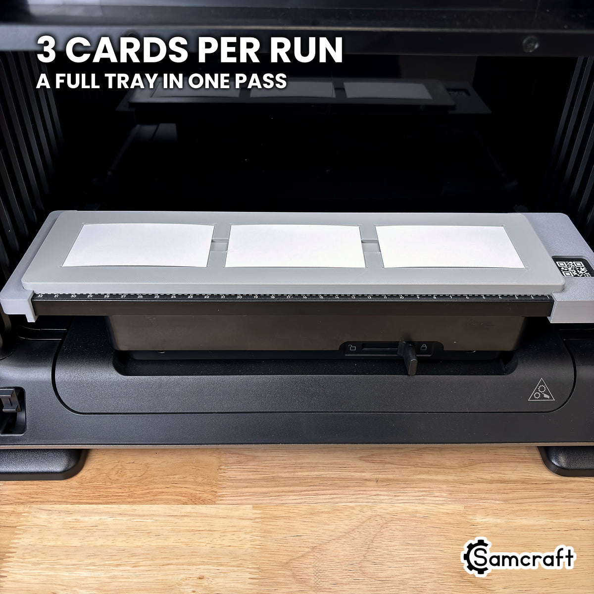 Front view of the Samcraft paper business card jig for the eufyMake E1 holding three blank business cards, a full tray in one pass.