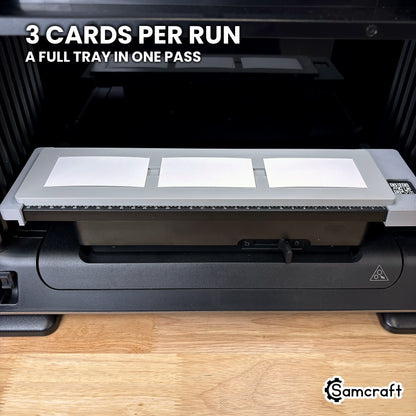 Front view of the Samcraft paper business card jig for the eufyMake E1 holding three blank business cards, a full tray in one pass.