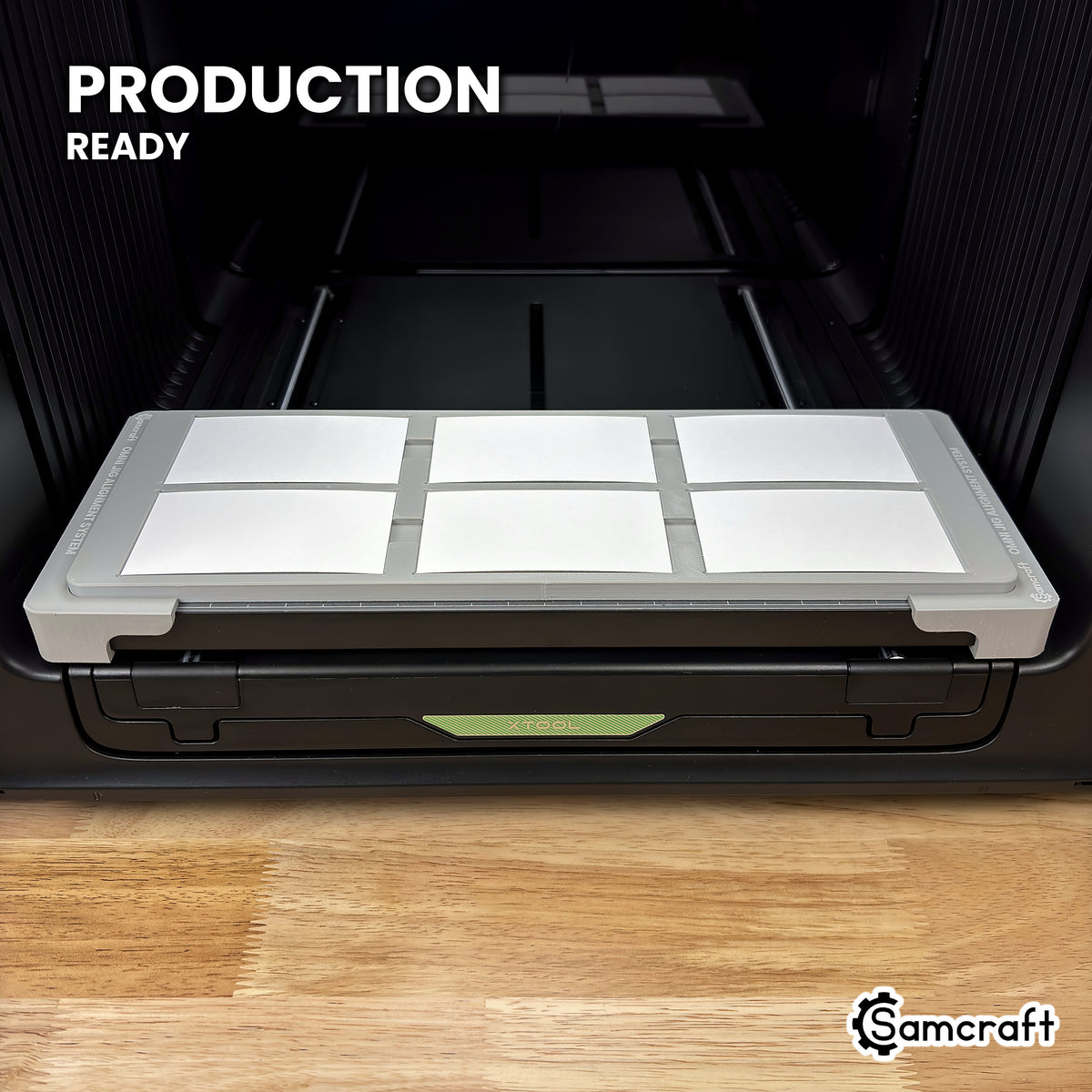Samcraft paper business card jig loaded with six cards on the xTool Omni UV printer bed, set up for production runs.