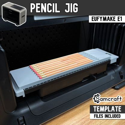 Main product image of the Samcraft Pencil Jig for the eufyMake E1 UV printer, showing a row of standard wooden pencils with pink erasers in a gray tray; template files included.