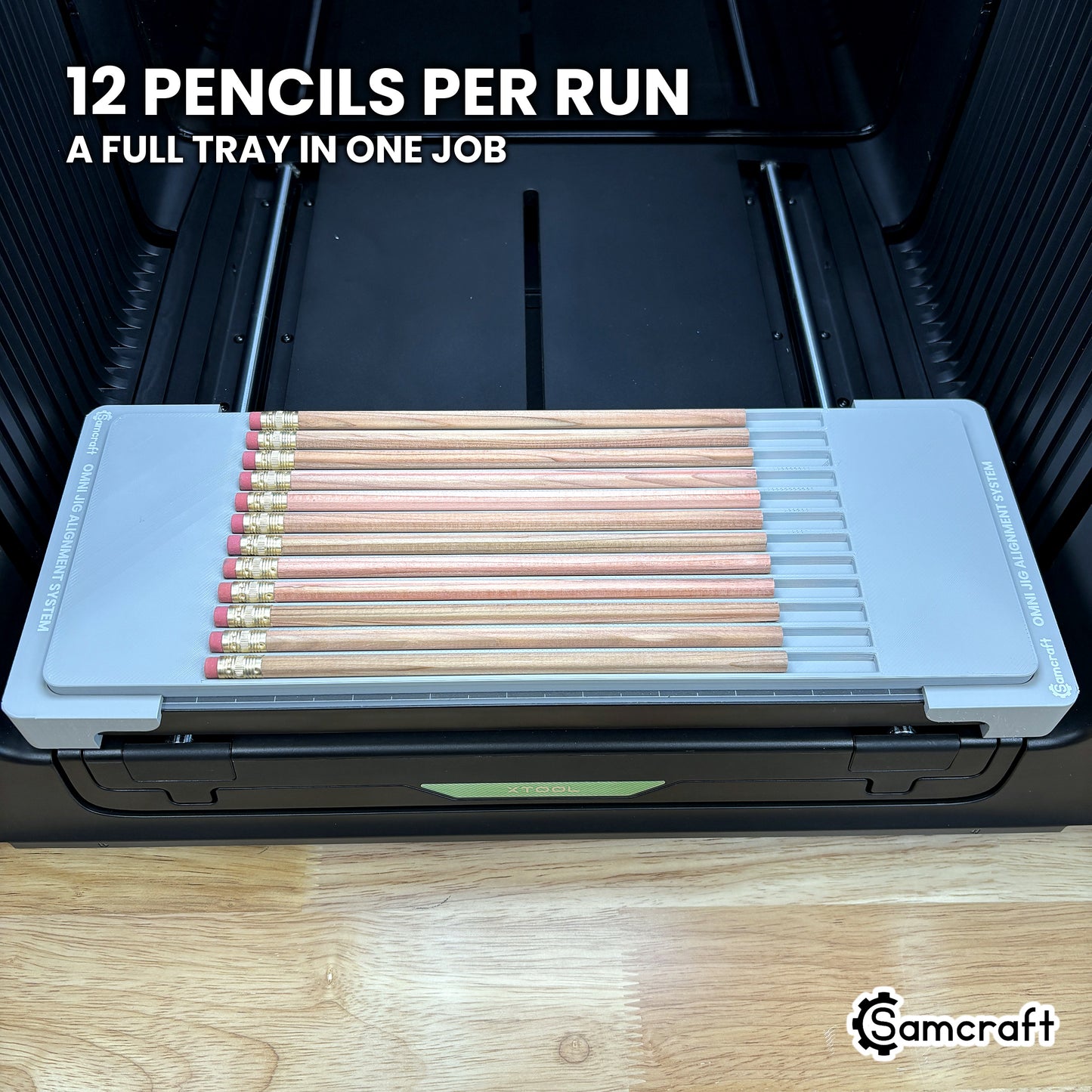 Top view of the Samcraft hexagon pencil jig for the xTool Omni with twelve pencils loaded, a full tray ready to run in one job.
