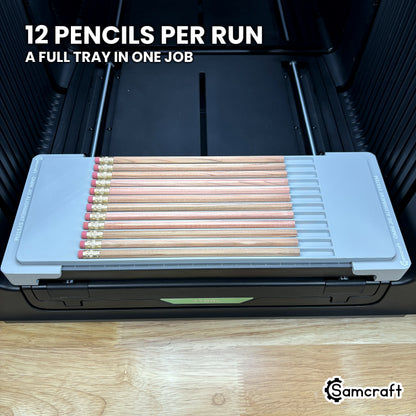 Top view of the Samcraft hexagon pencil jig for the xTool Omni with twelve pencils loaded, a full tray ready to run in one job.