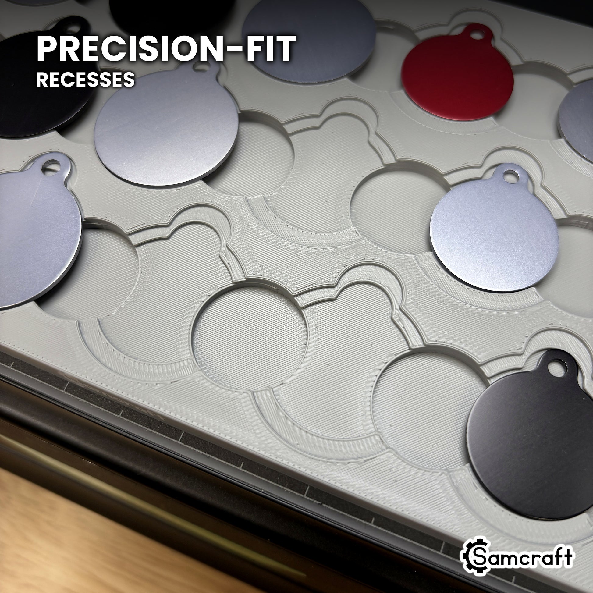 Close-up of the empty nested recesses in the Samcraft round pet tag jig, showing the precision-fit outer step and inner recess at every position.