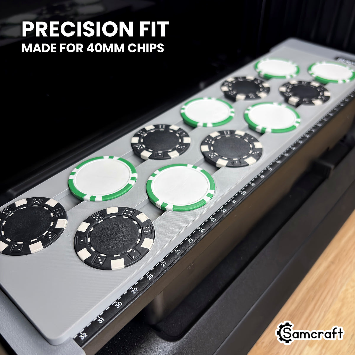 Close-up of 40 mm poker chips seated flush in the pockets of the Samcraft eufyMake E1 poker chip jig.