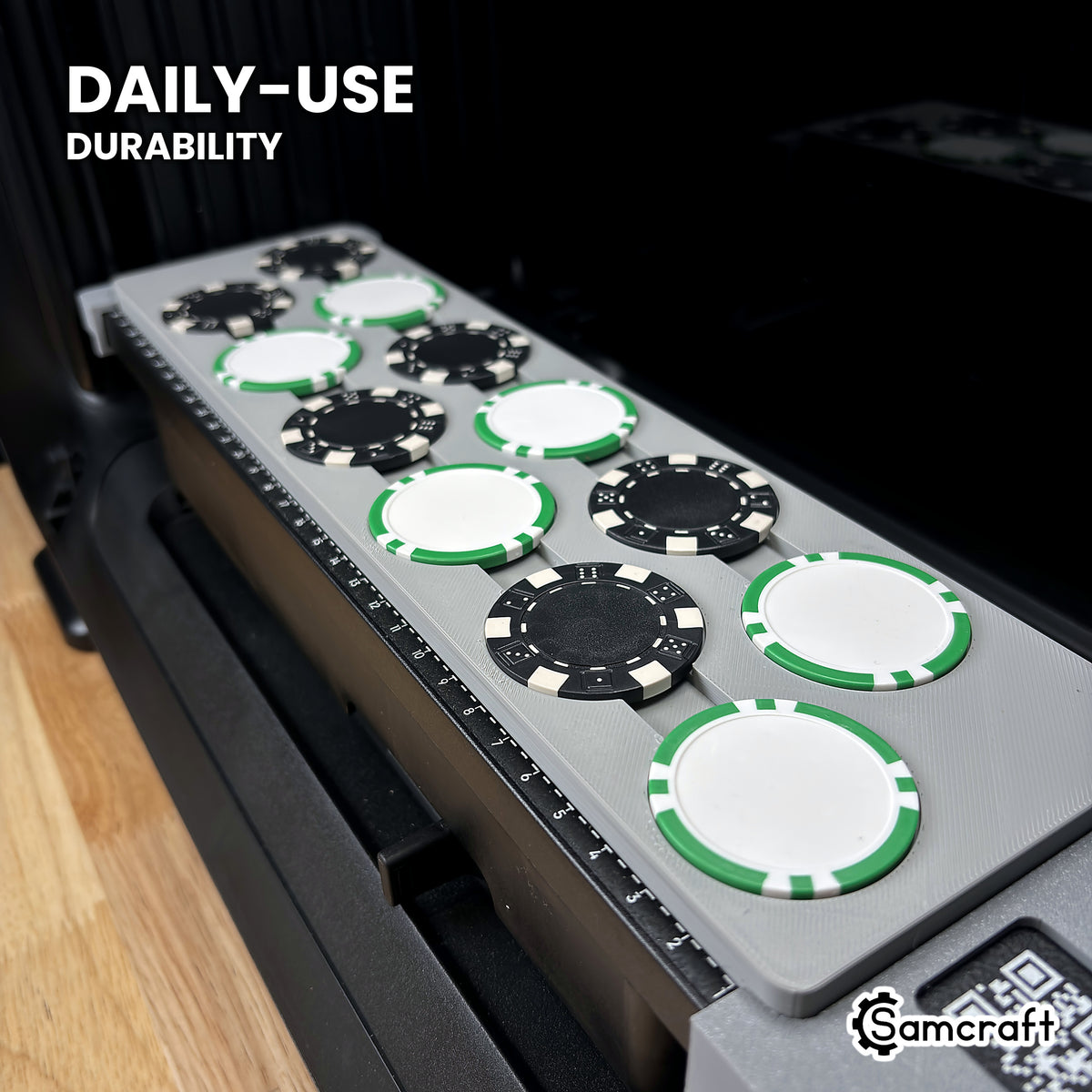 Samcraft eufyMake E1 poker chip jig loaded with chips, shown at an angle to highlight its solid one-piece build.