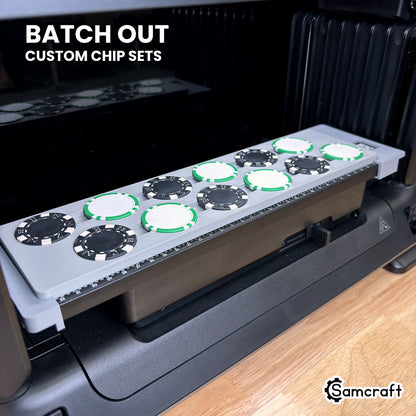 Samcraft poker chip jig on the eufyMake E1 UV printer bed holding 12 chips, ready to batch out custom poker chip sets.