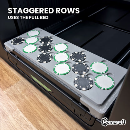 Angled view of the Samcraft xTool Omni poker chip jig showing three staggered rows of five chips across the full width of the bed.