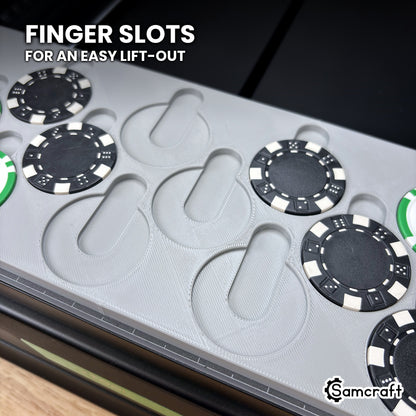 Close-up of the Samcraft xTool Omni poker chip jig with several pockets empty, showing the finger slot above each pocket for lifting chips out.