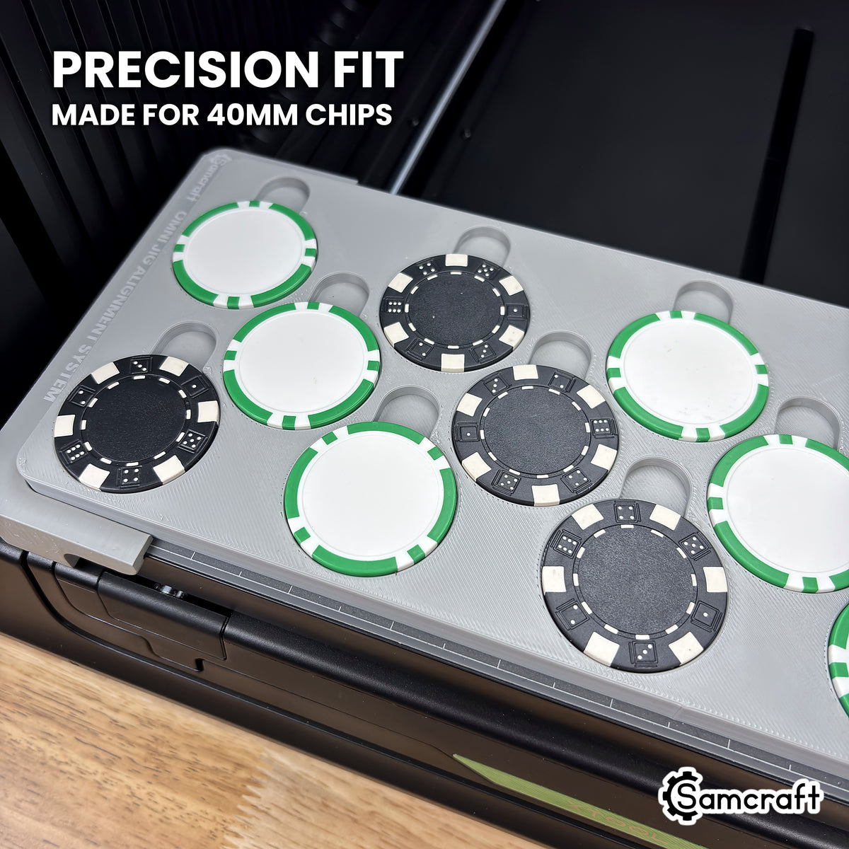 Close-up of 40 mm poker chips seated flush in the pockets of the Samcraft xTool Omni poker chip jig.