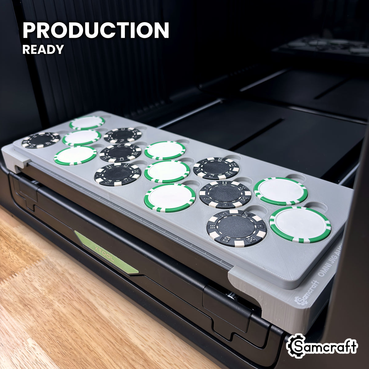 Samcraft poker chip jig loaded with 15 chips on the xTool Omni UV printer bed, set up for production runs.