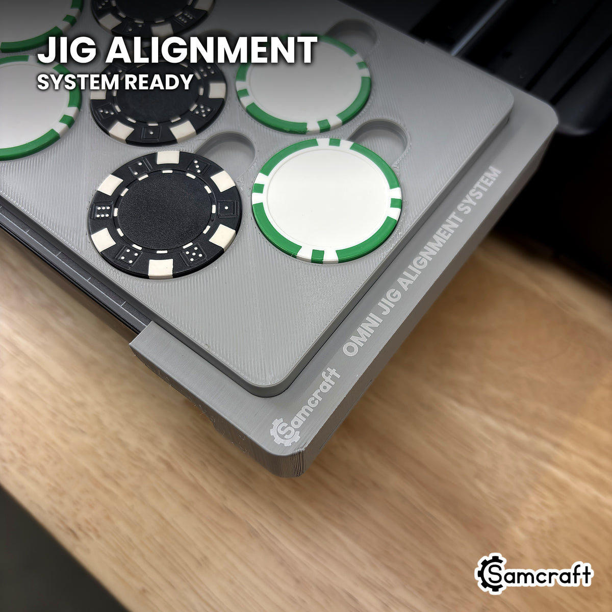 Close-up of the Samcraft poker chip jig seated in the xTool Omni Jig Alignment System end piece, with the Samcraft logo visible on the end piece.