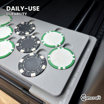 Samcraft xTool Omni poker chip jig loaded with chips, set in the Jig Alignment System, shown at an angle to highlight its solid one-piece build.