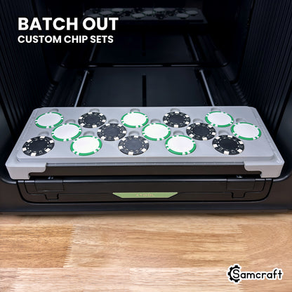 Samcraft poker chip jig on the xTool Omni UV printer bed holding 15 chips, ready to batch out custom poker chip sets.