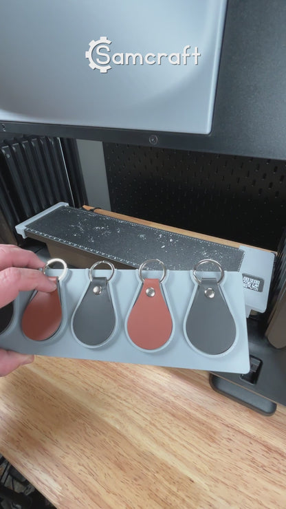 Video demonstration of the leather key fob keychain jig for the eufymake e1 uv printer in use.