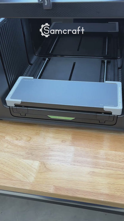 Video of the Samcraft baseball, softball and pickleball jig for the xTool Omni UV printer, with balls seated in the spherical cradles on the printer bed.