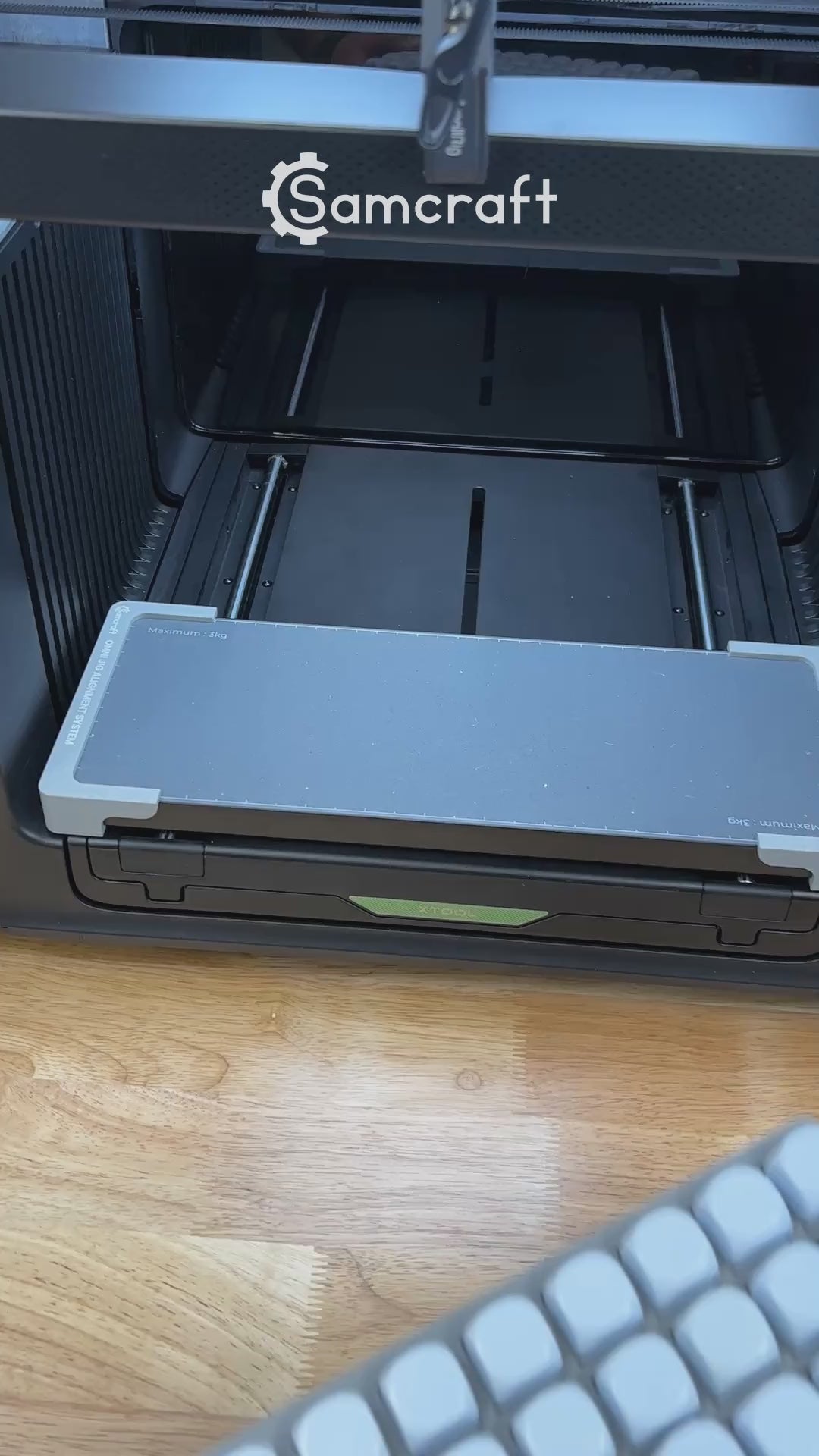Video of the Samcraft 22mm dice jig for the xTool Omni UV printer being loaded with blank dice and placed on the printer bed.