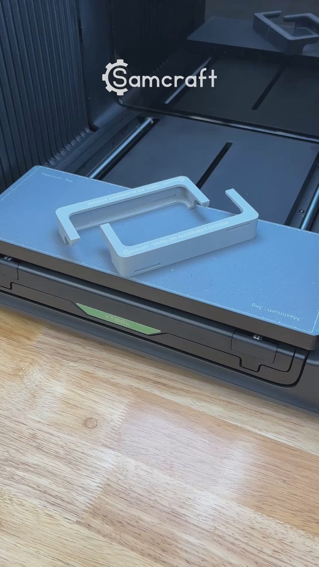 Video of the Samcraft Omni Jig Alignment System being slid onto the xTool Omni Standard bed and a jig dropped into place.