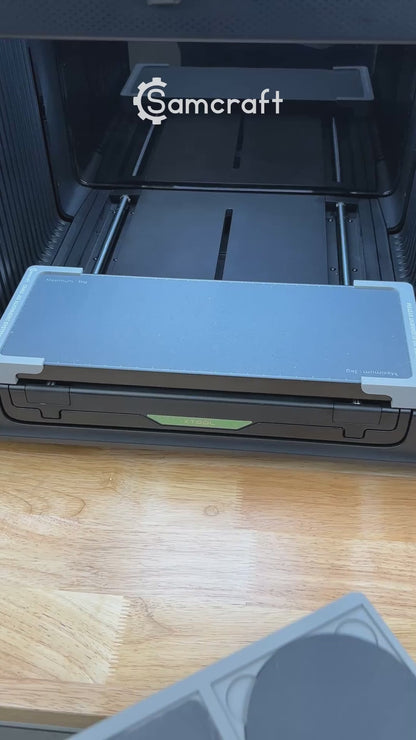 Video of the Samcraft 4 inch drink coaster jig for the xTool Omni UV printer being loaded with slate coasters and placed on the printer bed.