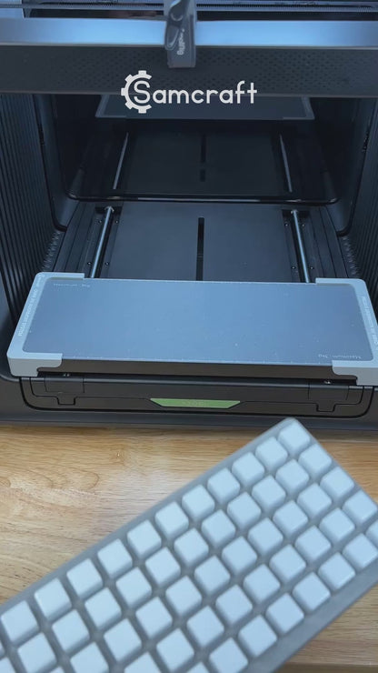 Video of the Samcraft 16mm dice jig for the xTool Omni UV printer being loaded with blank dice and placed on the printer bed.