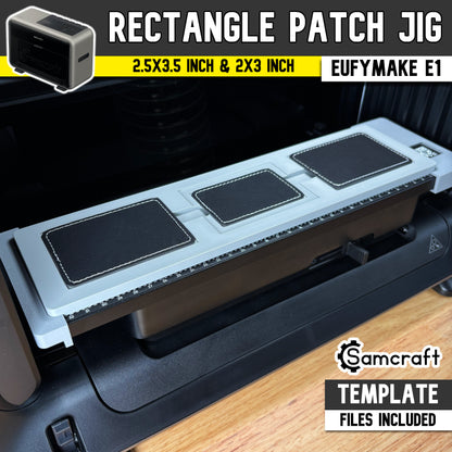 Rectangle Patch Jig for the eufyMake E1 — gray one-piece 3D-printed tray holding three black leather rectangle patches on the printer bed with built-in alignment ruler, available in 2.5x3.5 inch and 2x3 inch, template files included.
