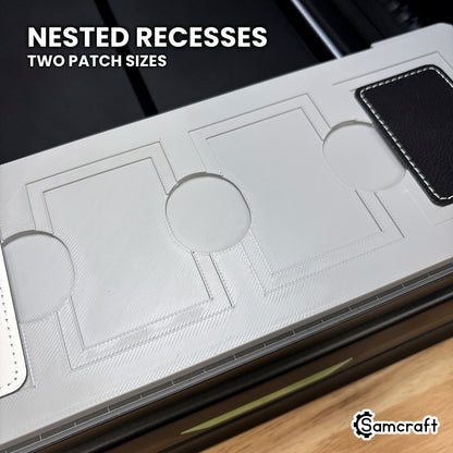 Close-up of the nested recesses in the Samcraft xTool Omni rectangle patch jig, the larger patch in the outer step and the smaller one in the inner.