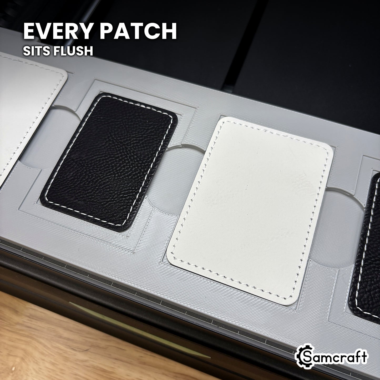 Rectangular leatherette patch seated flush in the Samcraft xTool Omni jig pocket, level with the surrounding surface.