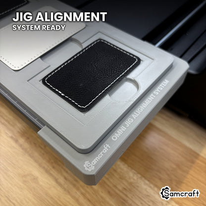 Samcraft rectangle patch jig seated on the optional Samcraft Omni Jig Alignment System, the alignment system lettering visible along the edge.