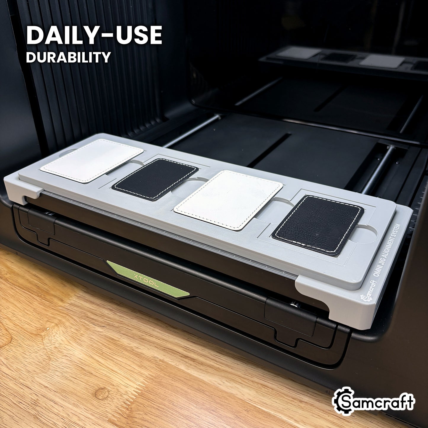 Samcraft xTool Omni rectangle patch jig held in hand, showing the durable one-piece construction built for daily use.