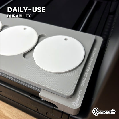 Close-up of white ceramic ornaments in the Samcraft round ceramic ornament jig on the Omni Jig Alignment System, built for daily-use durability.