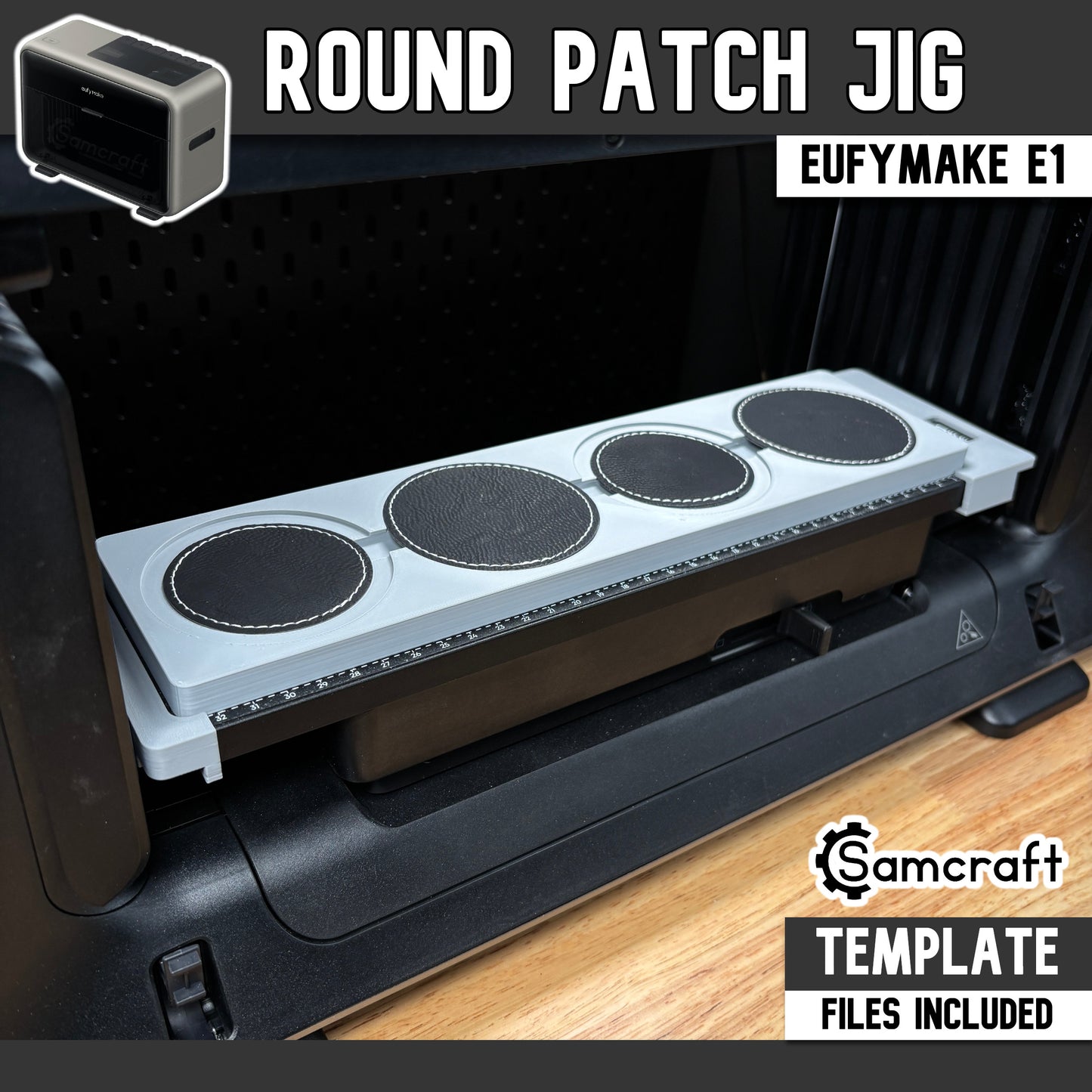 Round Patch Jig for the eufyMake E1 UV printer — gray one-piece 3D-printed tray holding four round black leather patches with white stitched borders in a row, each seated in a circular recessed pocket, with a built-in alignment ruler along the front edge; template files included.