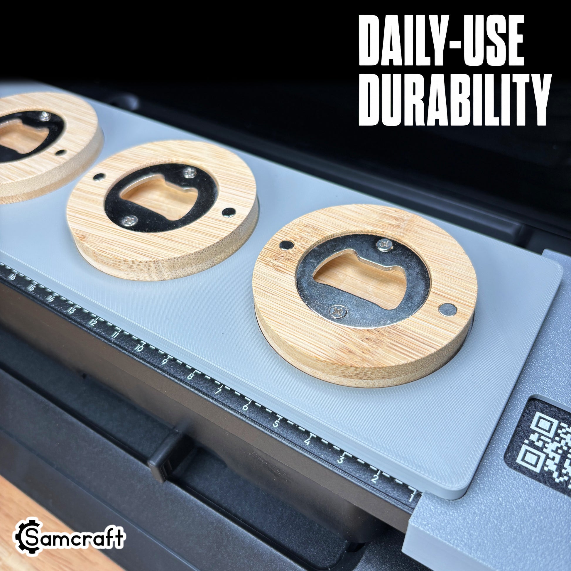 Close-up of round wooden bottle openers seated in the Samcraft jig, showing the metal opener insert and magnets