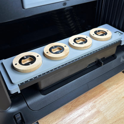 Samcraft Round Wooden Opener Jig holding four round wooden magnetic bottle openers on the eufyMake E1 print bed