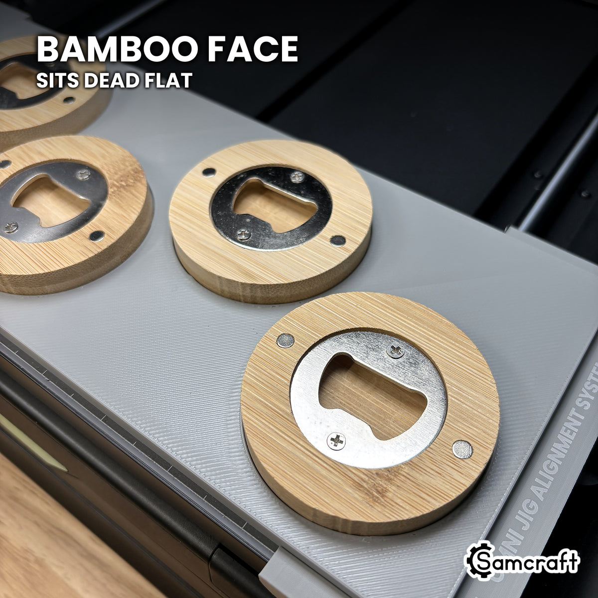 Close-up of a bamboo bottle opener sitting dead flat in the Samcraft xTool Omni jig for an even print across the face.