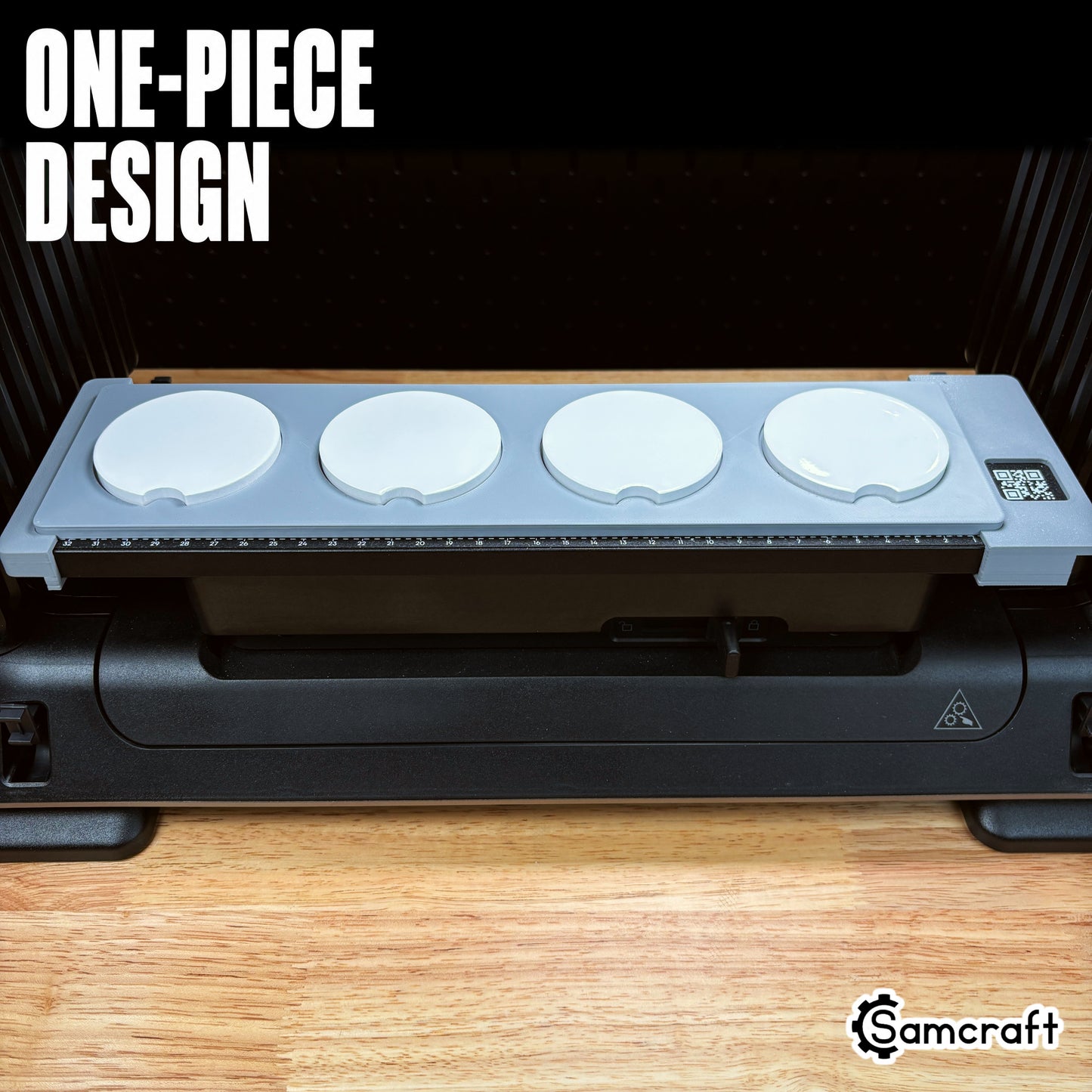 Samcraft one-piece car coaster jig on a eufyMake UV printer, holding four round coasters in aligned slots