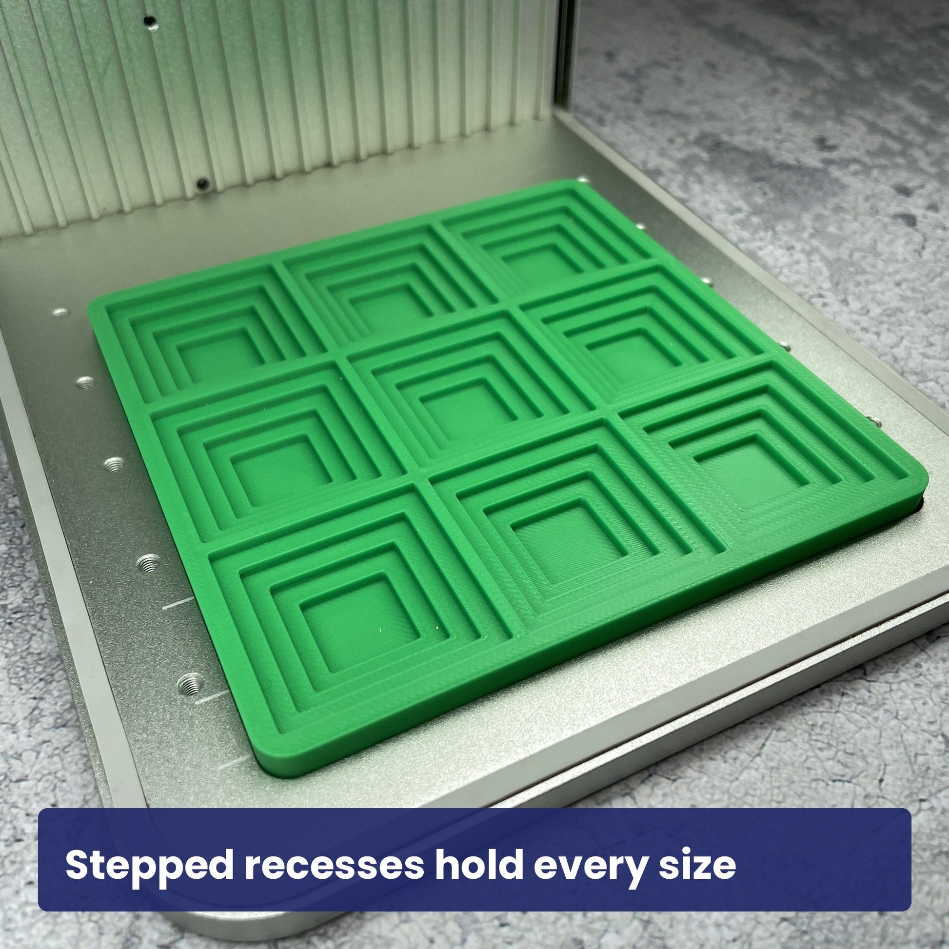 Close view of the stepped recesses in the Samcraft small square block jig.