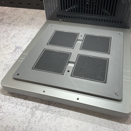 Samcraft square patch jig on the xTool F2 Ultra bed, holding square leatherette patches.