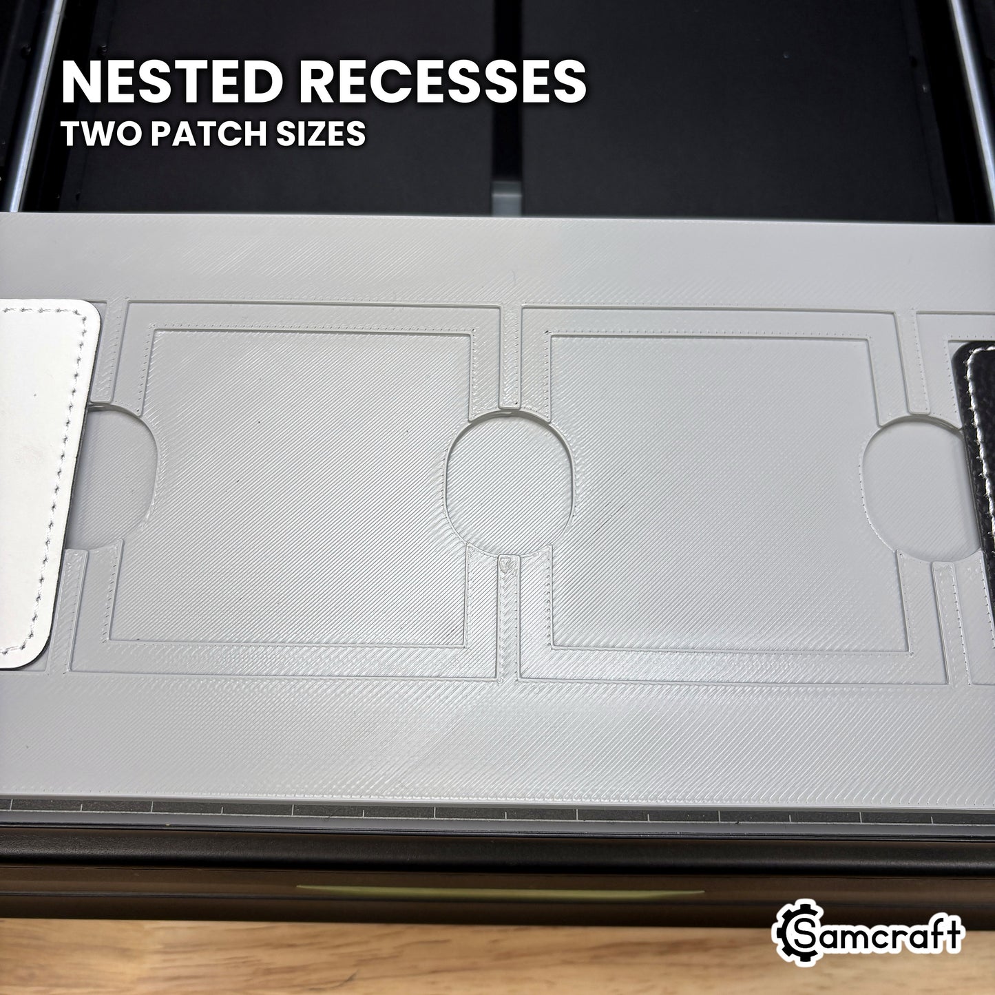 Close-up of the nested recesses in the Samcraft xTool Omni square patch jig, the larger patch in the outer step and the smaller one in the inner.