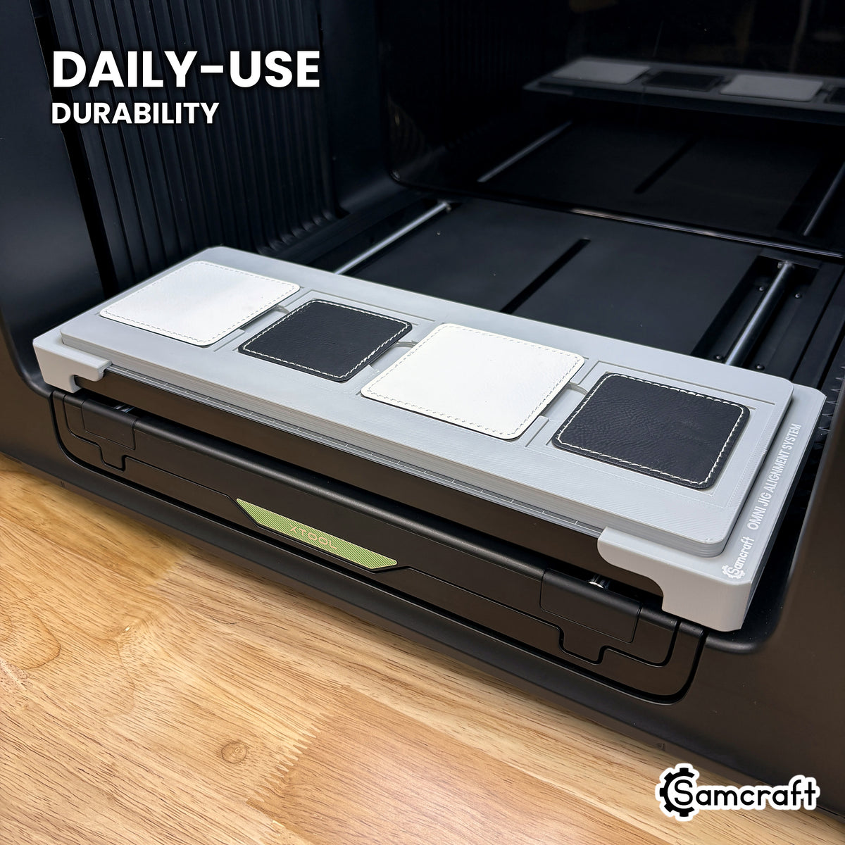 Samcraft xTool Omni square patch jig held in hand, showing the durable one-piece construction built for daily use.