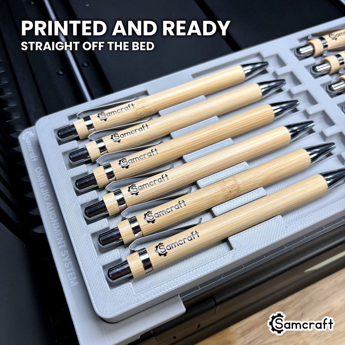 Printed bamboo pens resting in the Samcraft xTool Omni pen jig, finished and ready straight off the printer bed.