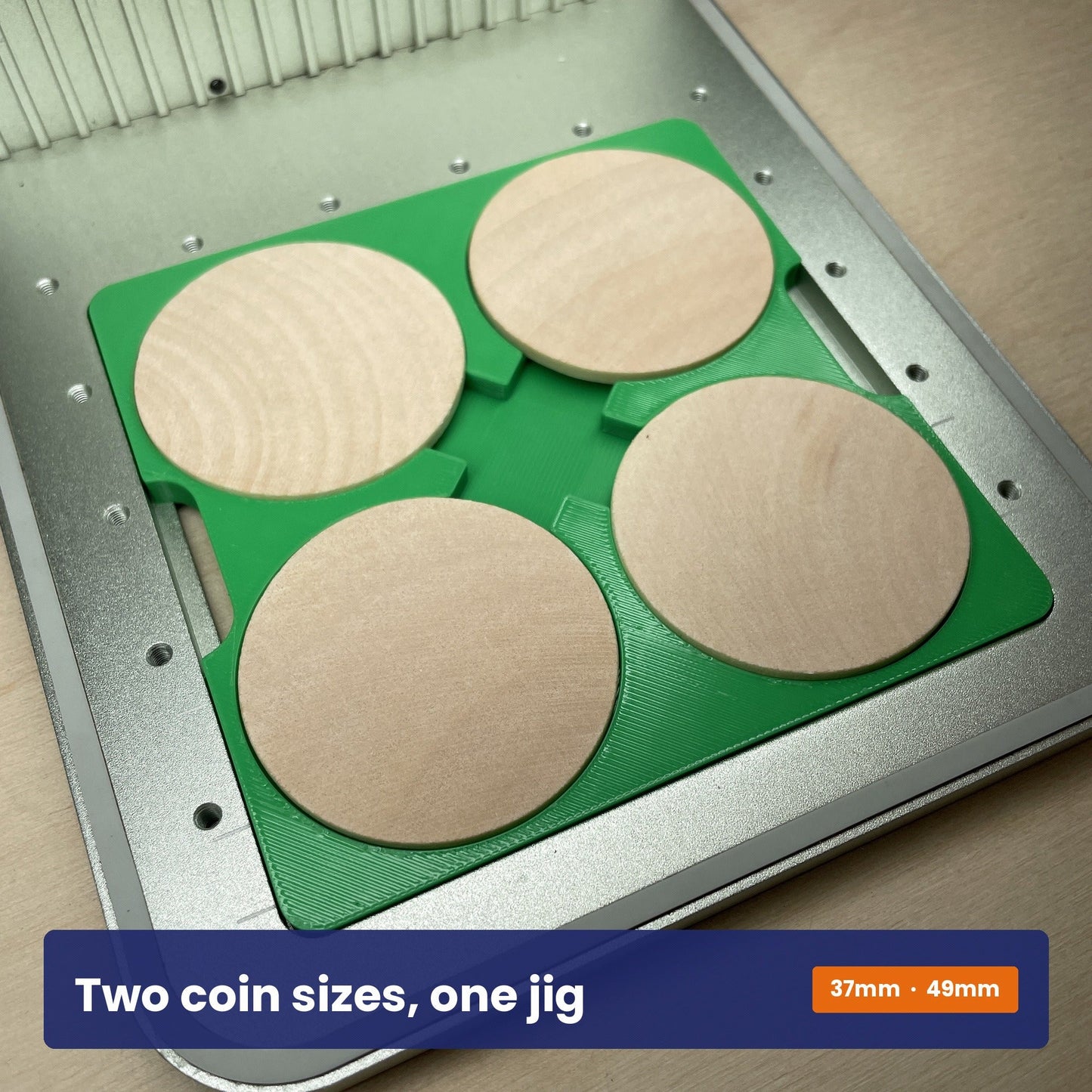 Wood coin jig holding wooden coins in both of the sizes it accepts.