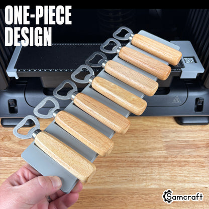 Wood Handle Bottle Opener Jig for the eufyMake E1 — hand holding the gray one-piece 3D-printed tray loaded with wood-handle bottle openers, template files included, highlighting the one-piece design.