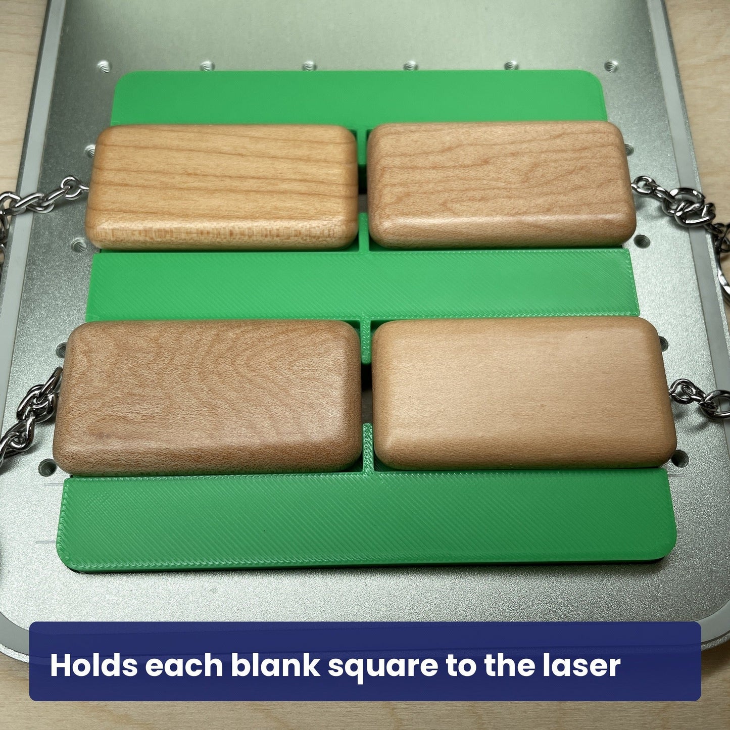 Wood rectangle keychain blanks seated square in the Samcraft jig, ready to engrave.